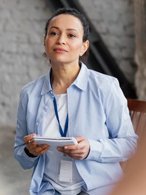 Counselor with notepad